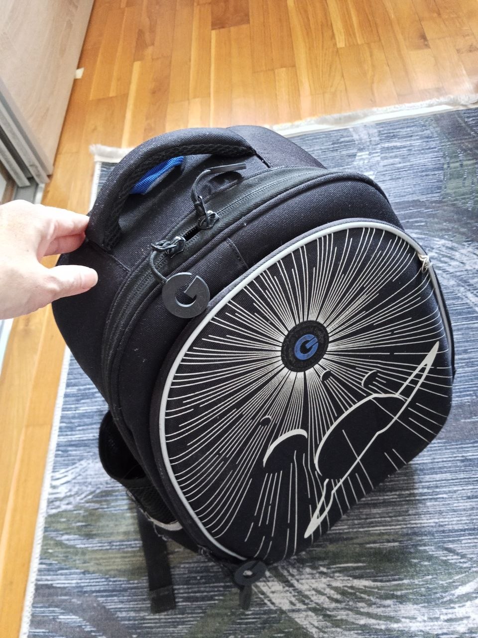 Backpack with rigid back