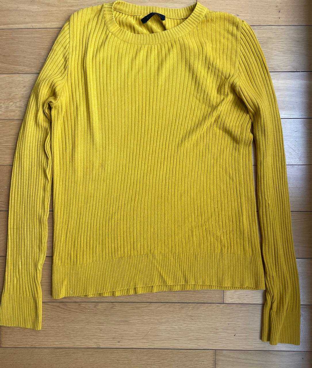 yellow knitted sweater