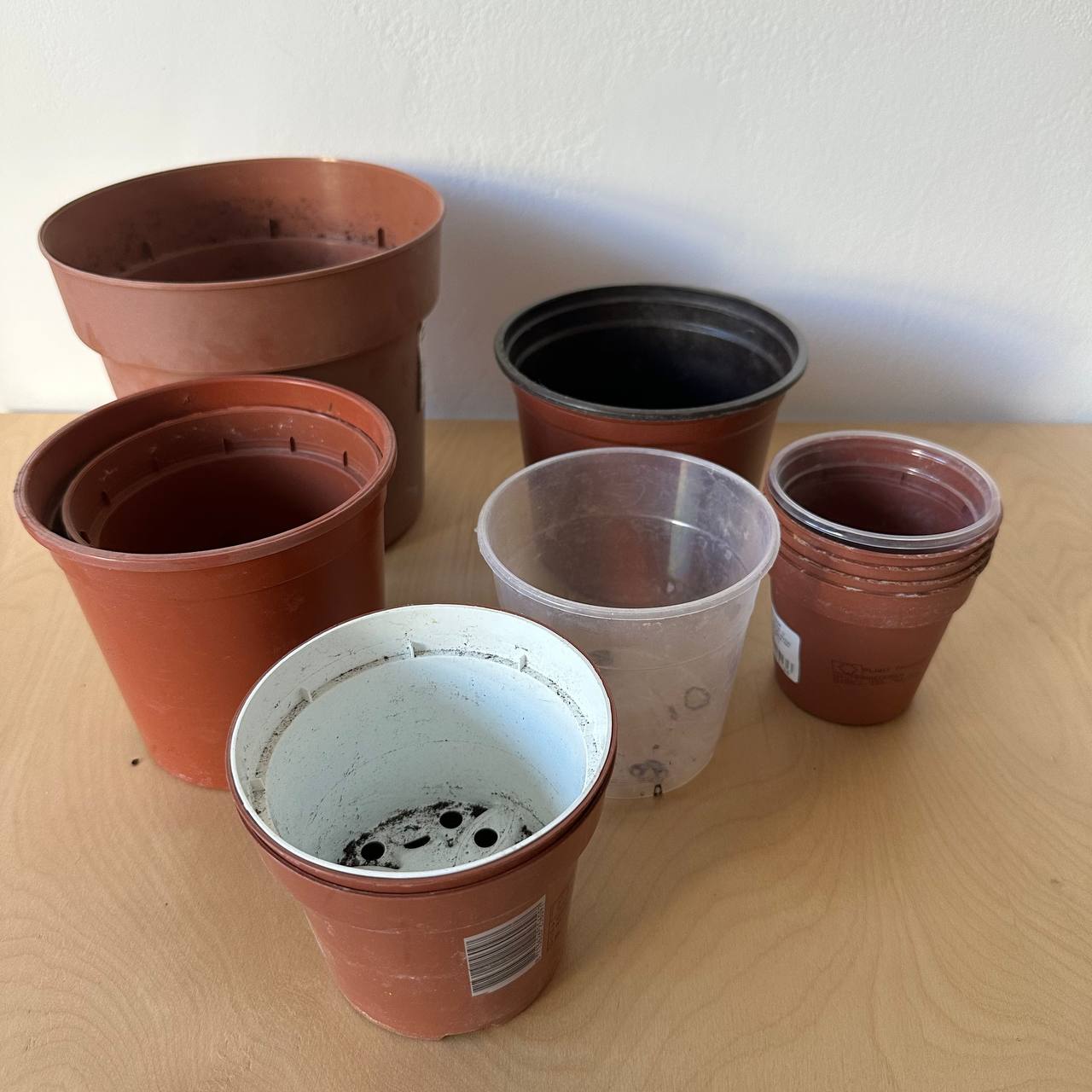 Transport and transplant pots for flowers