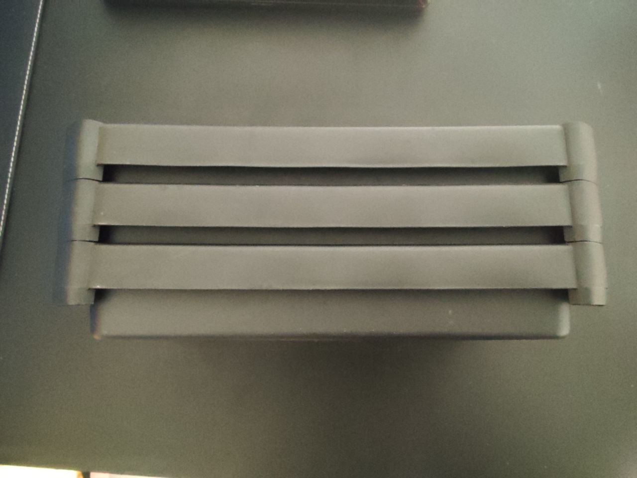 black plastic shelf and storage box photo 2