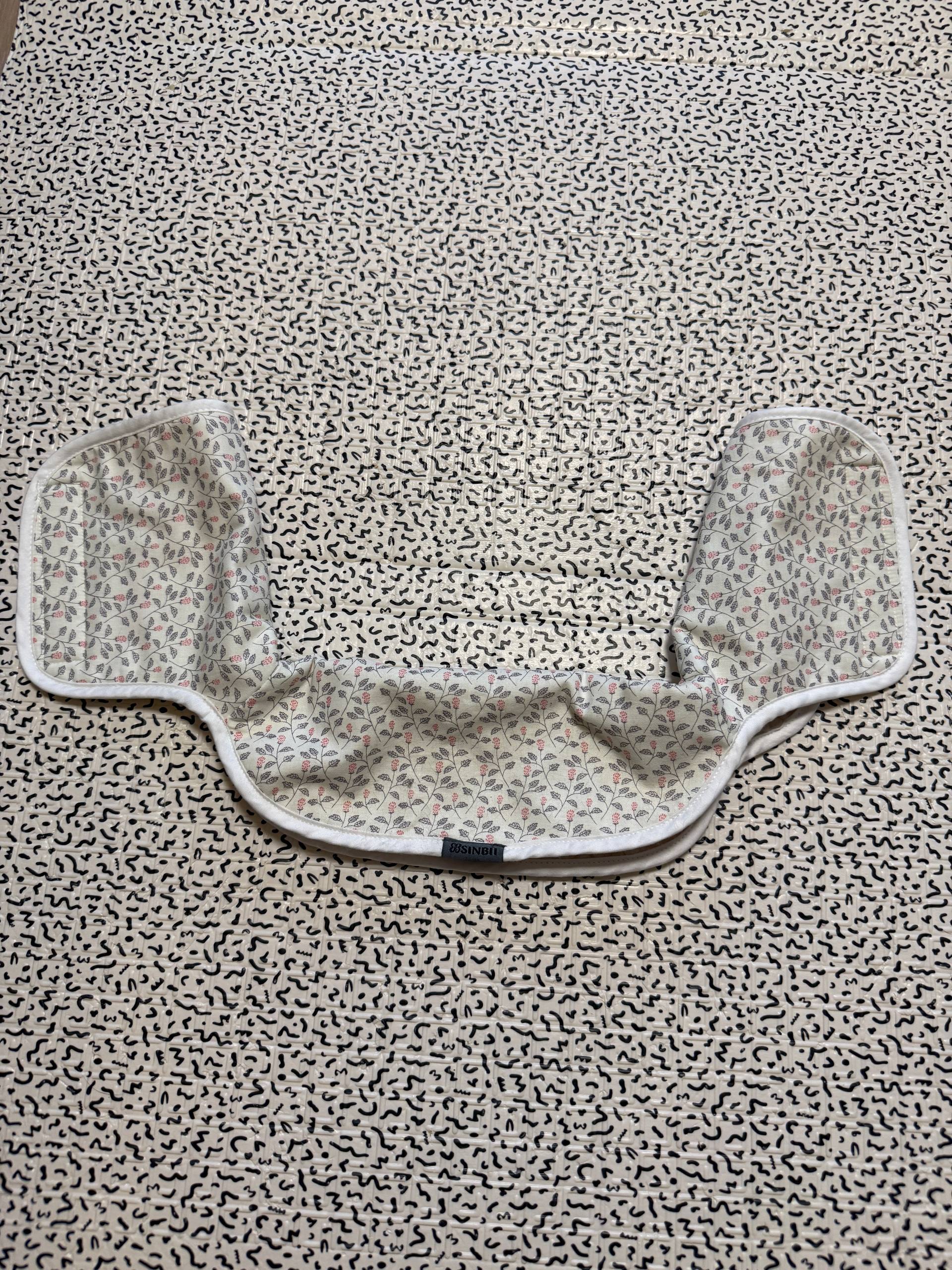 Chest pad for ergonomic backpack