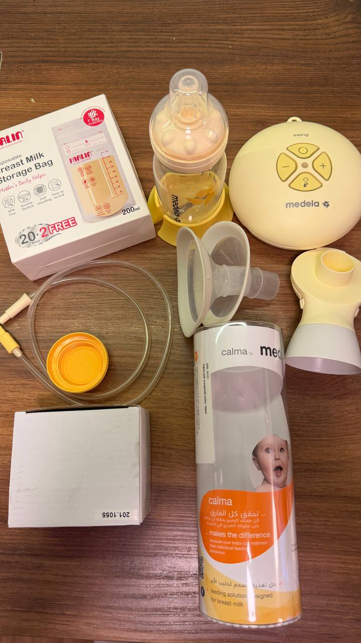 Молокоотсос Medela swing