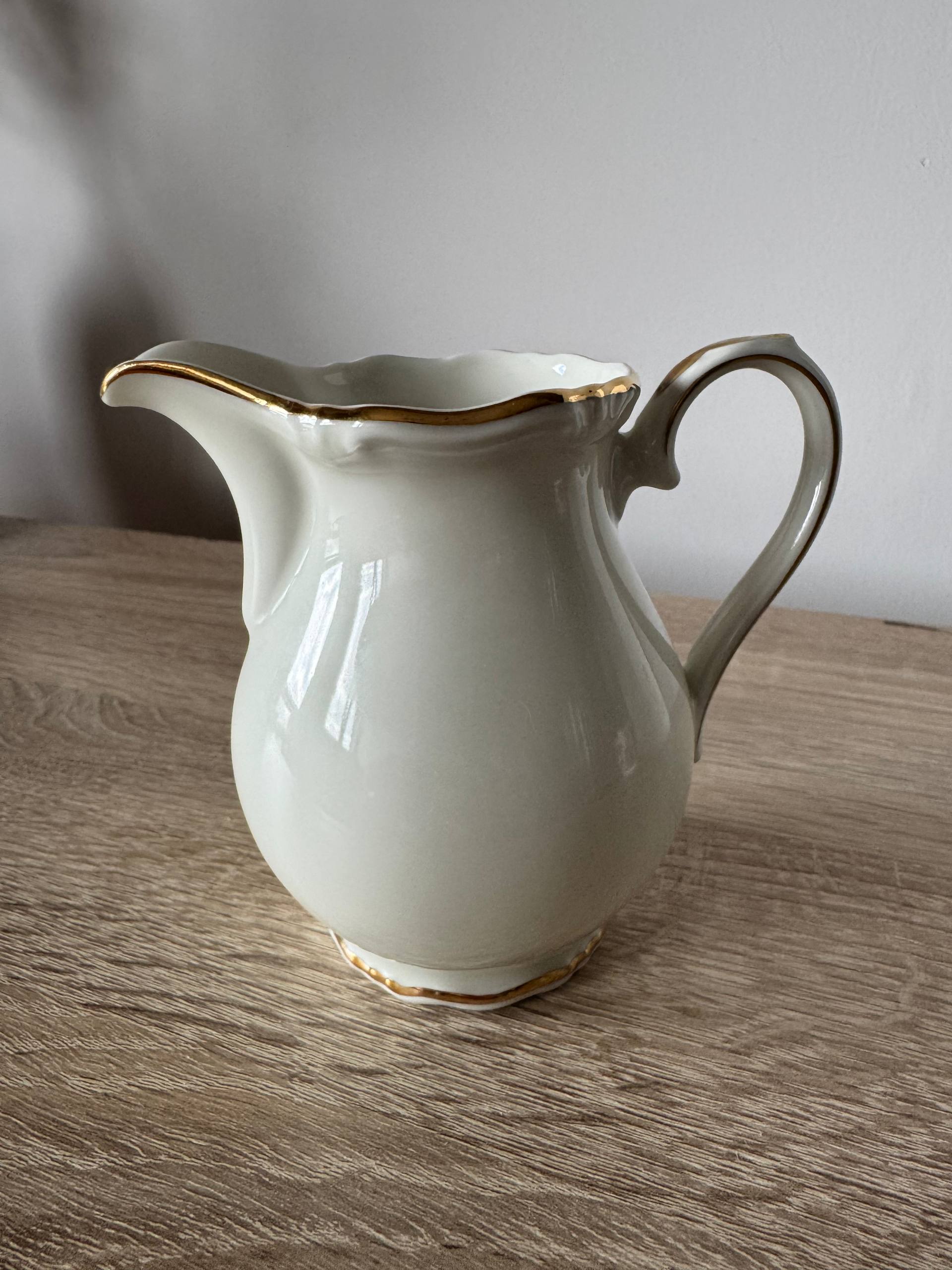 Vintage cream-beige porcelain milk jug/sauce dish