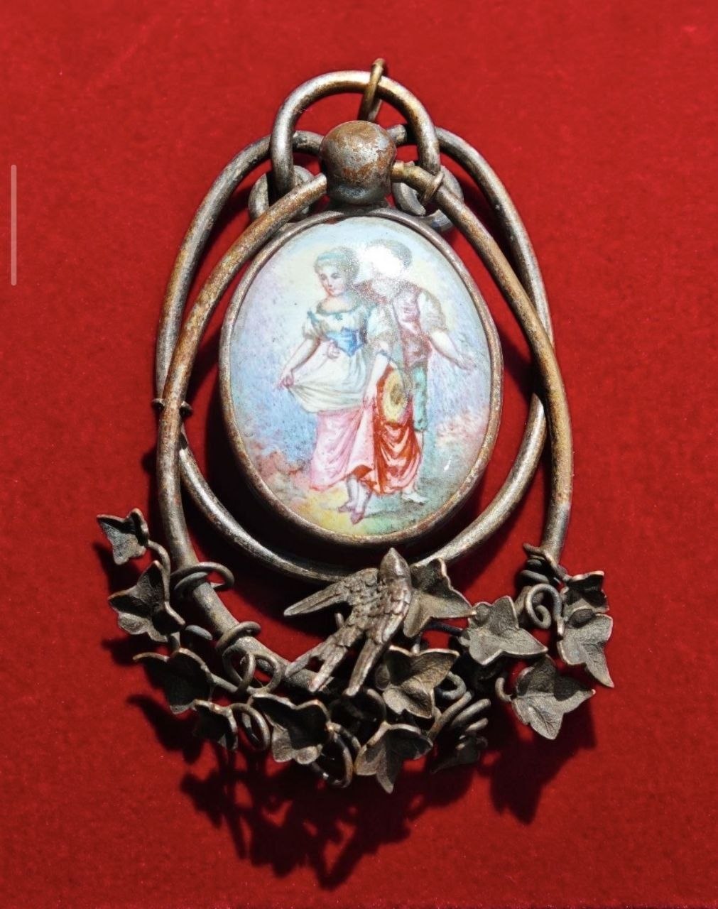 Antique brooch with coral imitation