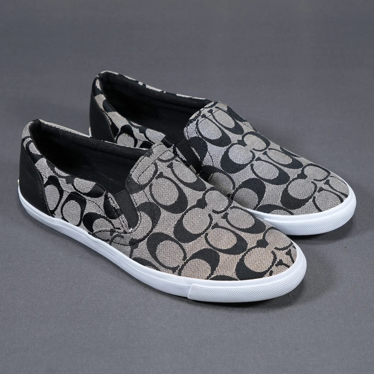 Coach Alegra Signature slip-ons