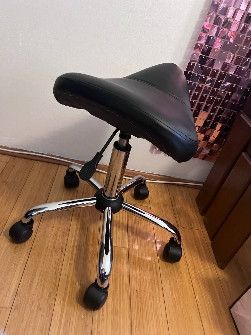Alexander cosmetics saddle chair